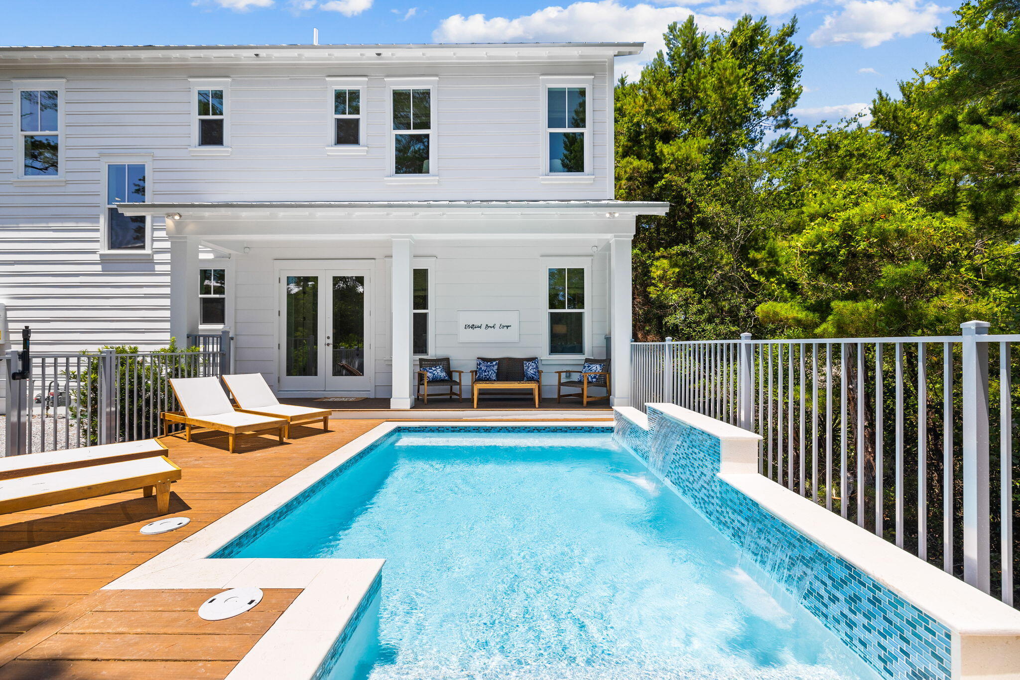 213 Spotted Dolphin Road Santa Rosa Beach, FL 32459 - Photo 14 of 72 a view of a house with pool and sitting area