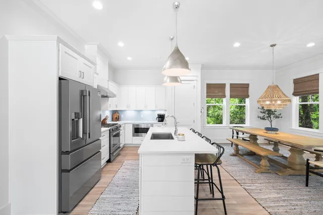 a view of room with window and wooden floor