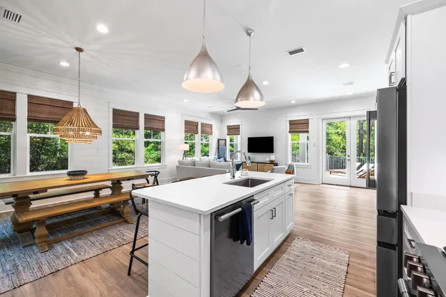 a bedroom with a bed and a night stand