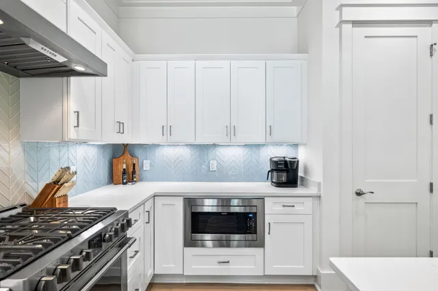 a bedroom with a bed and flat screen tv