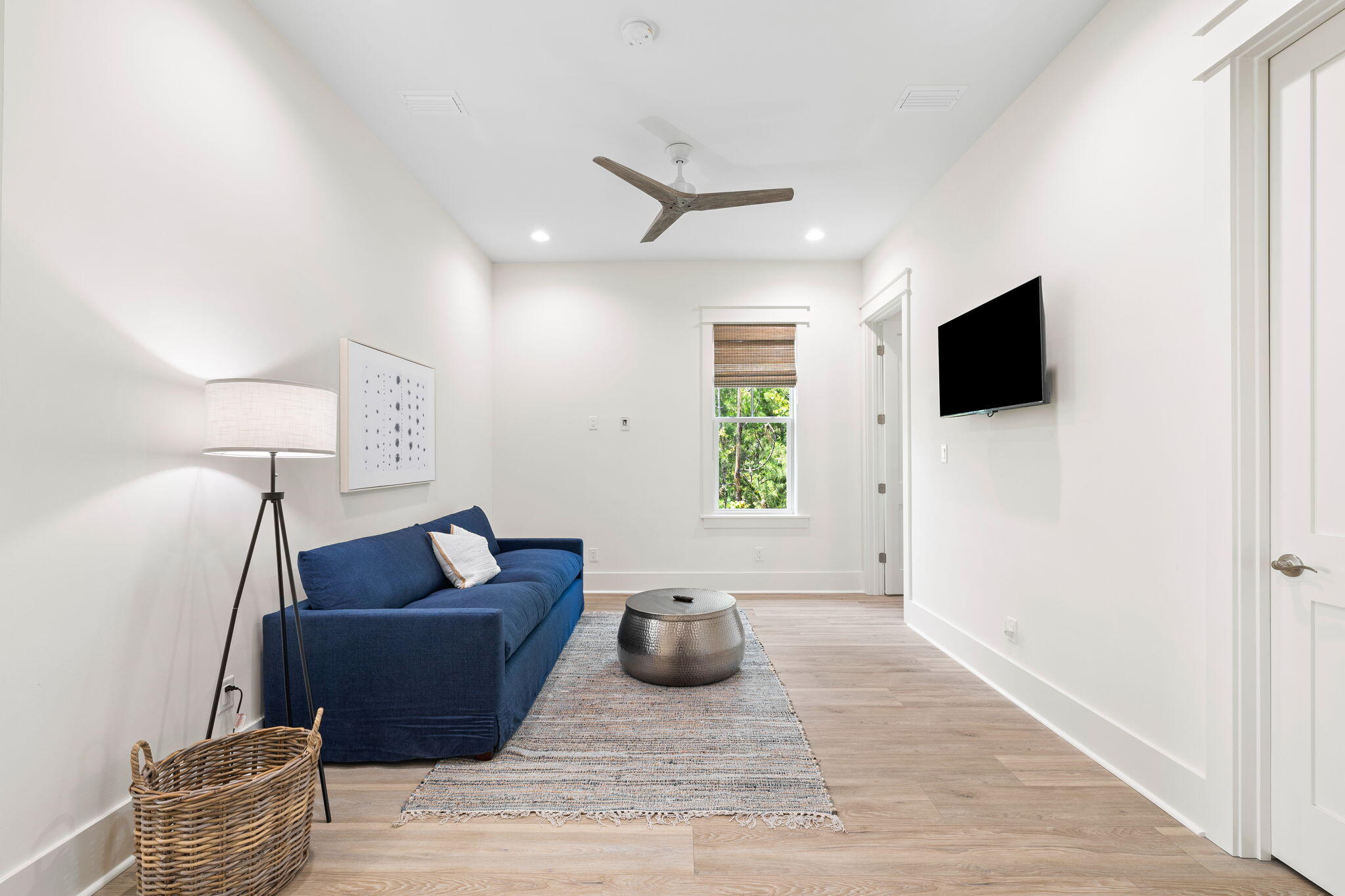 213 Spotted Dolphin Road Santa Rosa Beach, FL 32459 - Photo 38 of 72 a living room with furniture and a flat screen tv