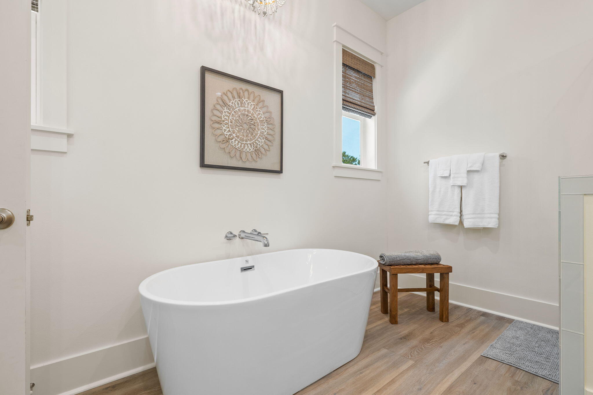 213 Spotted Dolphin Road Santa Rosa Beach, FL 32459 - Photo 46 of 72 a white bath tub sitting next to a white sink and a bathroom