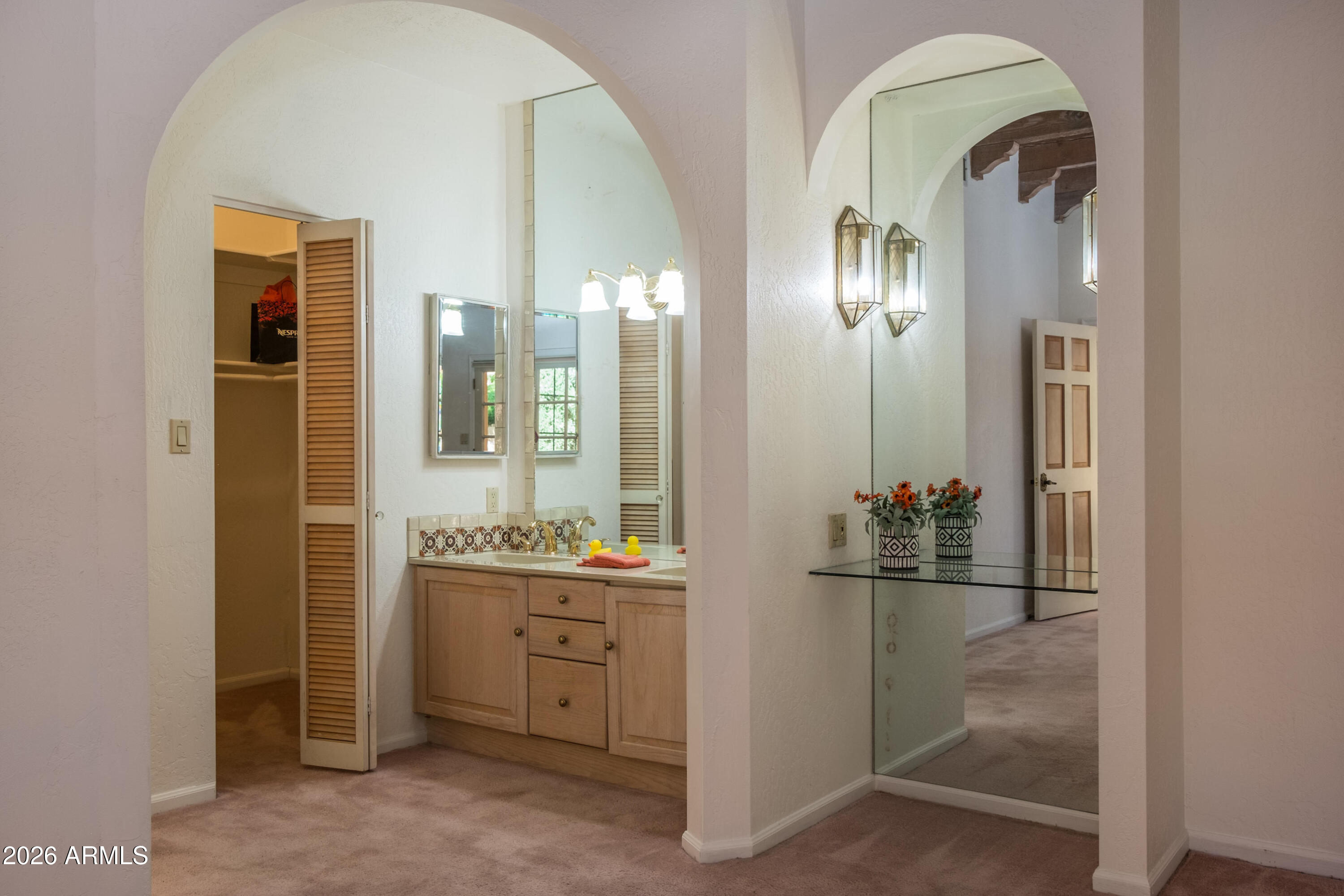 15 Ridge View Drive, Unit 17 Sedona, AZ 86351 - Photo 18 of 41 Main closet, bath & dressing table