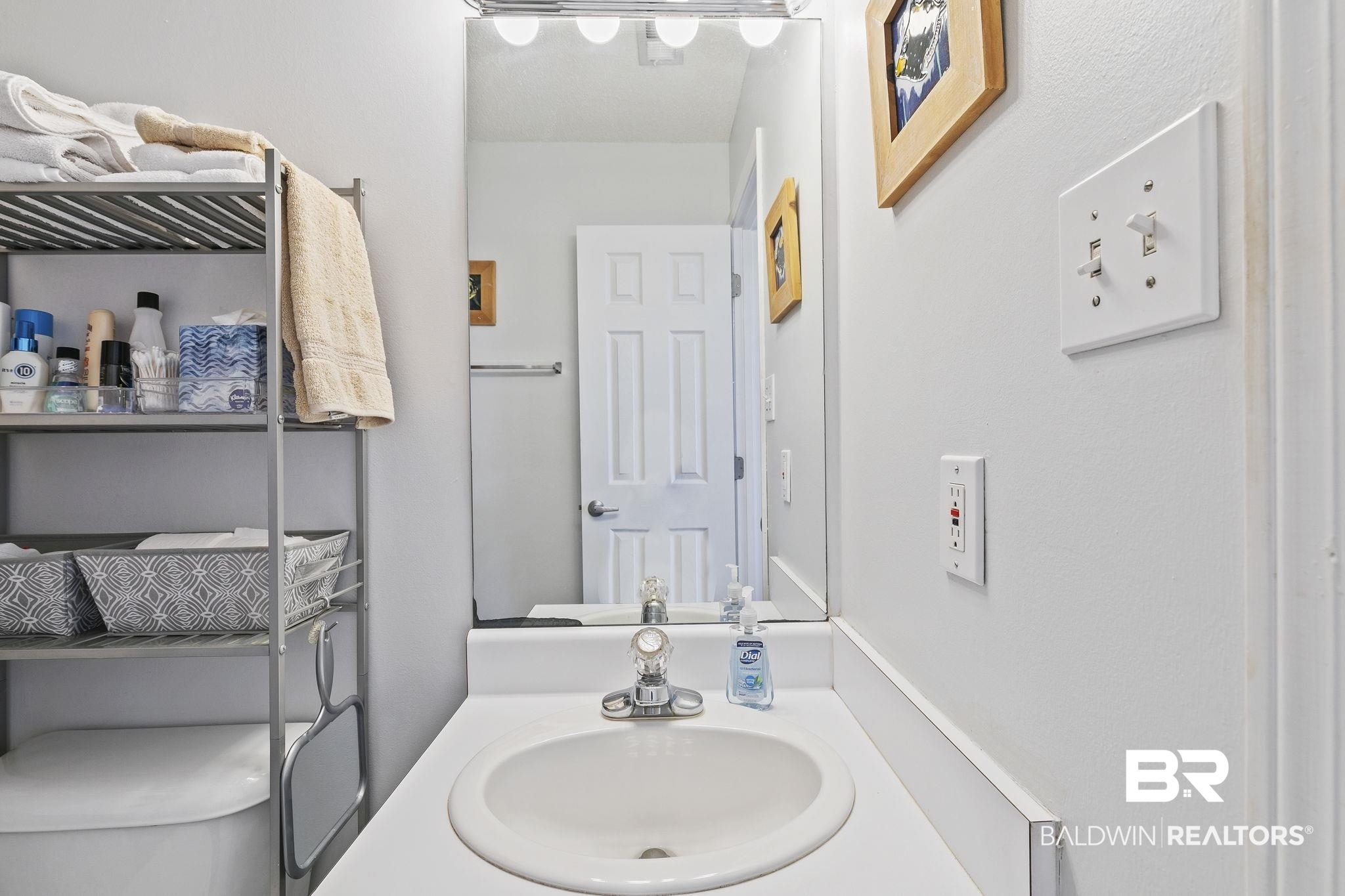 25861 Canal Road, Unit 78 Orange Beach, AL 36561 - Photo 25 of 45 Bathroom featuring vanity and toilet