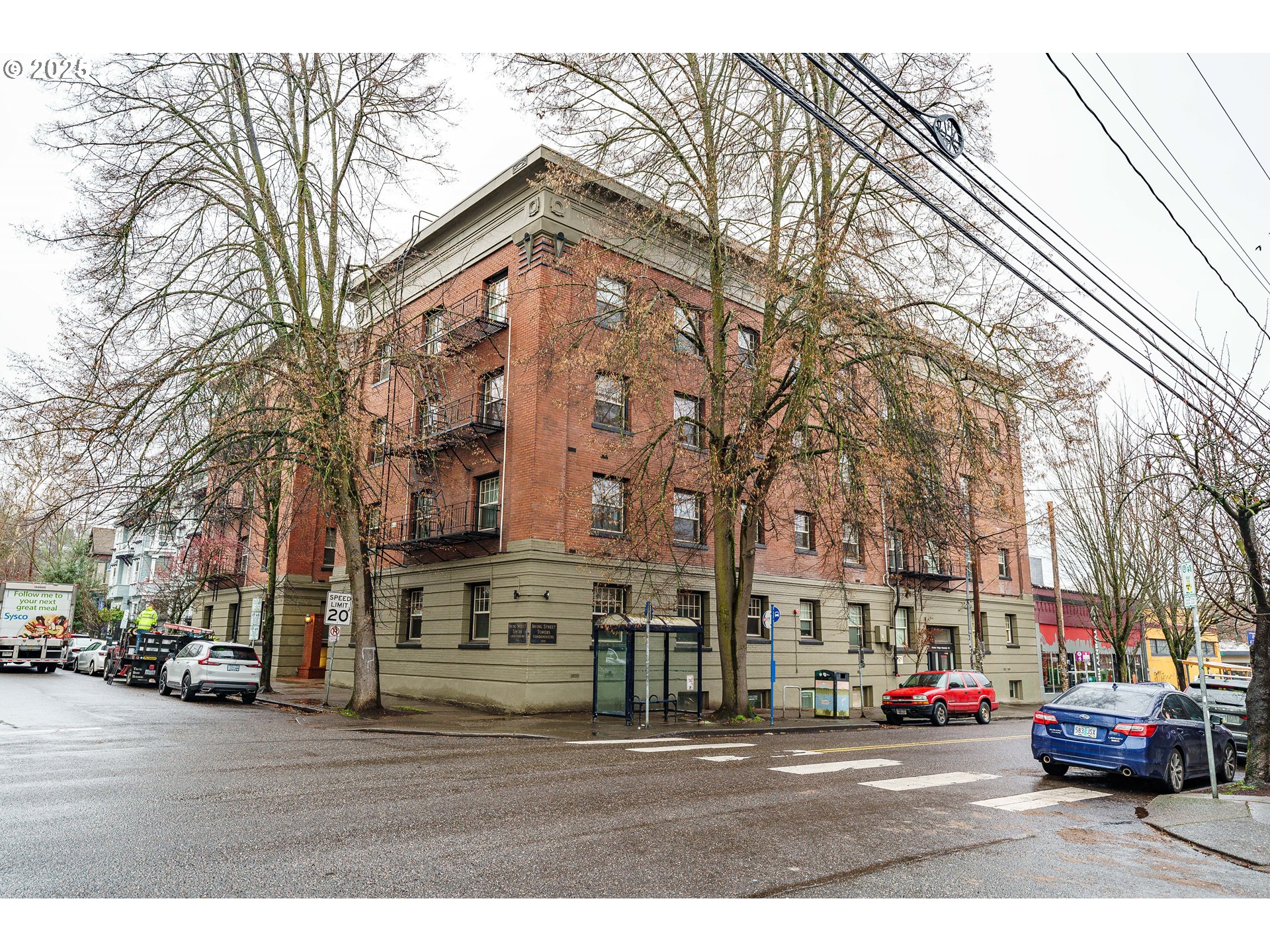 2109 Northwest Irving Street, Unit 114 Portland, OR 97210 - Photo 28 of 29 a view of a building and a street