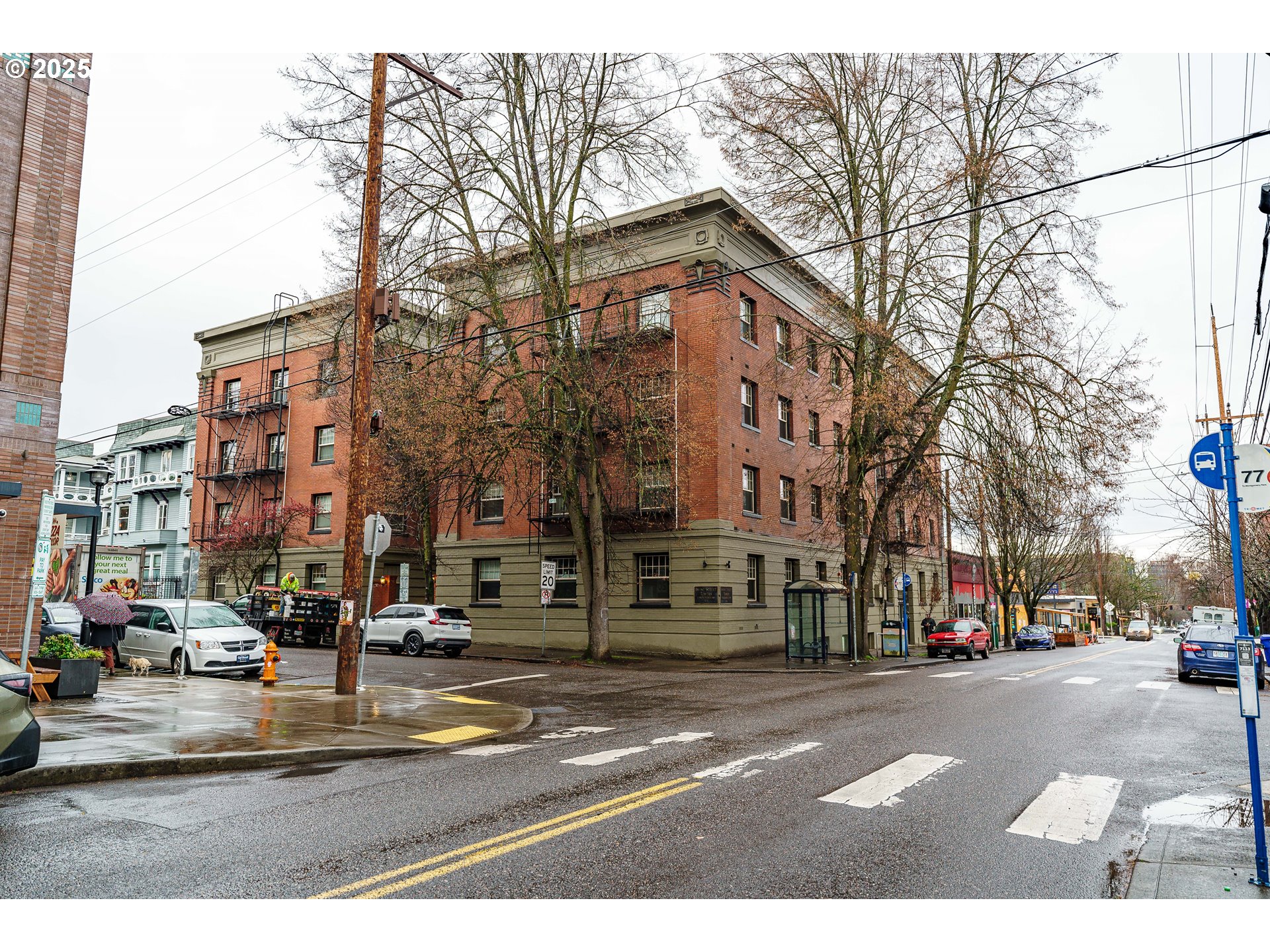 2109 Northwest Irving Street, Unit 114 Portland, OR 97210 - Photo 29 of 29 a view of street with cars