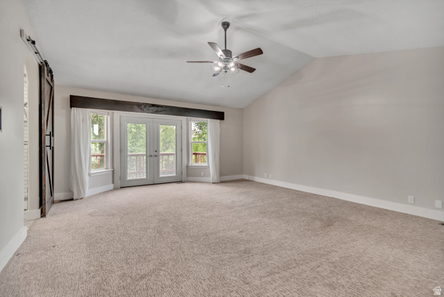 2154 Wasatch Boulevard Sandy, UT 84092 - Photo 13 of 55 Unfurnished room with french doors, vaulted ceiling, light colored carpet, and ceiling fan