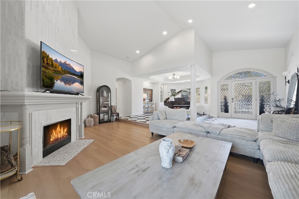 41110 Los Ranchos Circle Temecula, CA 92592 - Photo 18 of 77 a living room with furniture and a fireplace