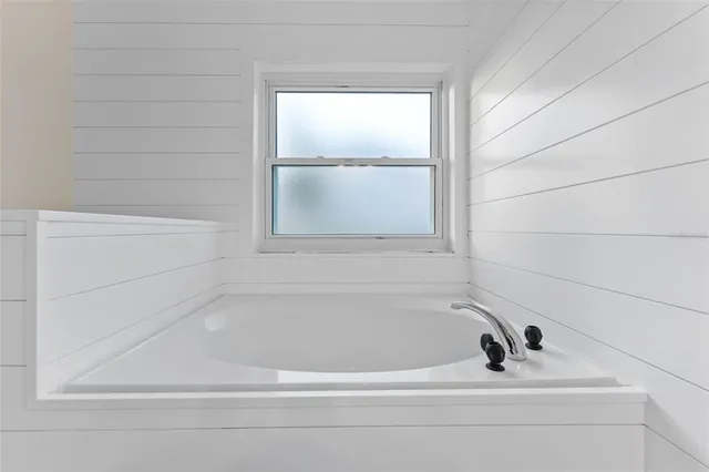 a bathroom with a bathtub