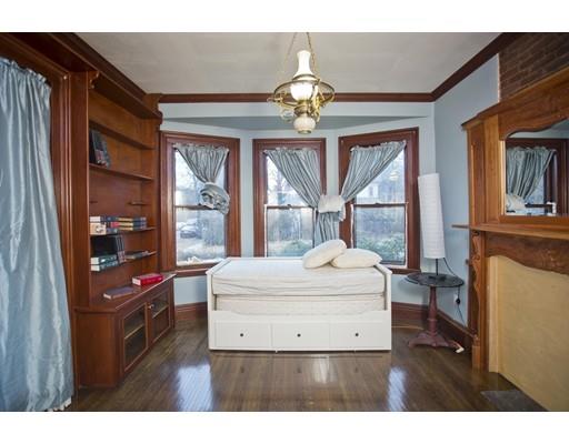 101 Westminster Street Springfield, MA 01109 - Photo 17 of 29 a living room with furniture a chandelier and a large window