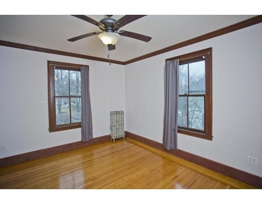 101 Westminster Street Springfield, MA 01109 - Photo 23 of 29 a view of an empty room with window and chandelier fan