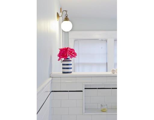 101 Westminster Street Springfield, MA 01109 - Photo 28 of 29 a bathroom with a sink vanity and mirror