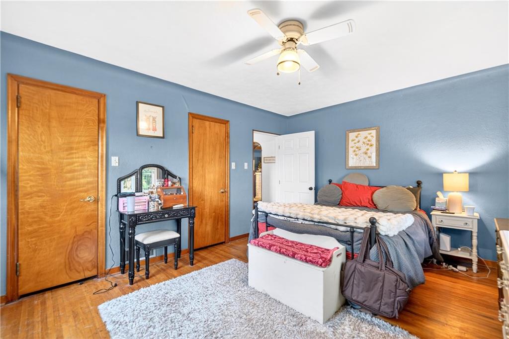 1188 Willowbrook Road Belle Vernon, PA 15012 - Photo 42 of 50 a bedroom with a bed and a table in it