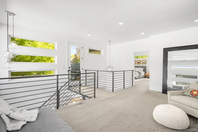 a view of a livingroom with furniture and window