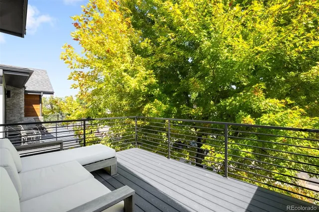 a view of house with outdoor seating