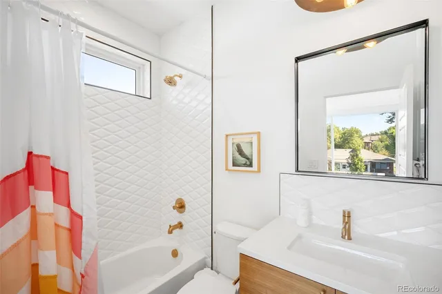 a bathroom with a sink and a bathtub