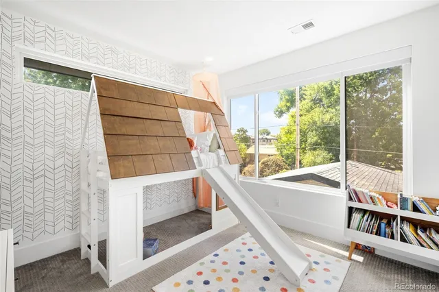a view of a room with window and an outdoor view