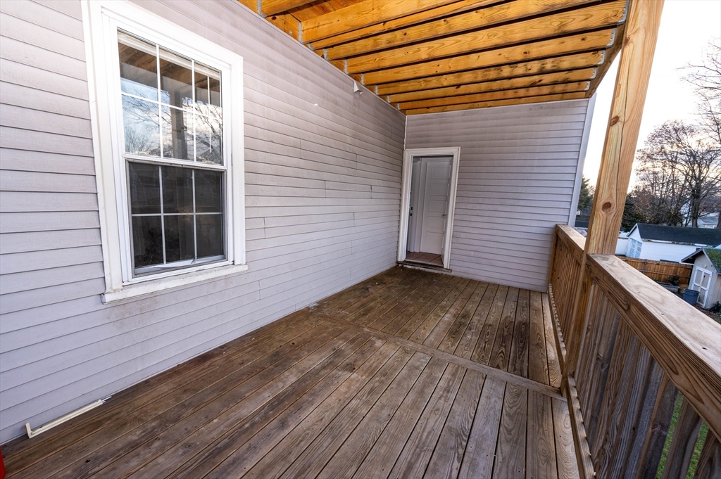 5 Colchester Street, Unit 2 Boston, MA 02136 - Photo 17 of 19 a view of a house with wooden deck