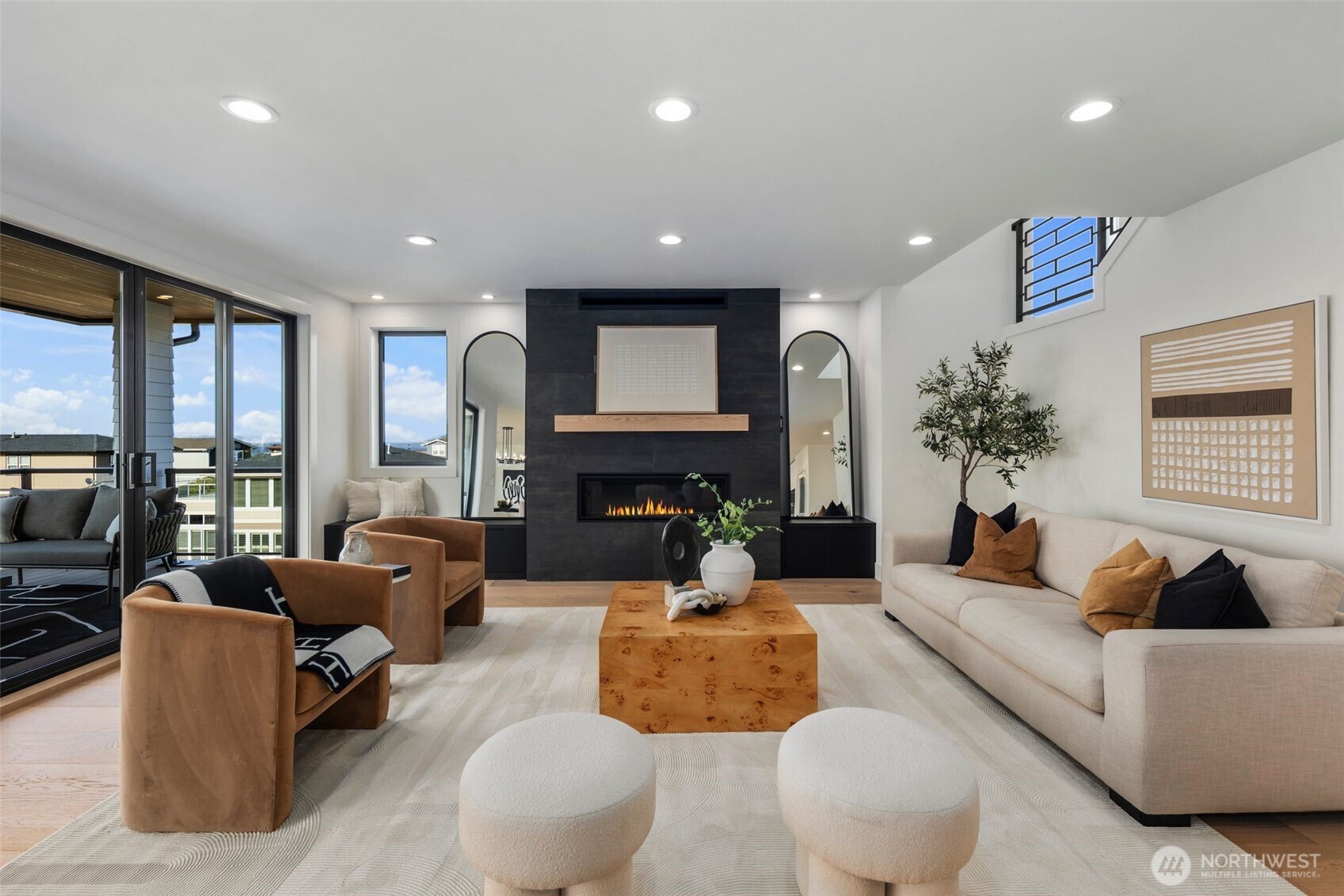 5301 North Commercial Street Ruston, WA 98407 - Photo 13 of 40 a living room with fireplace furniture and a large window