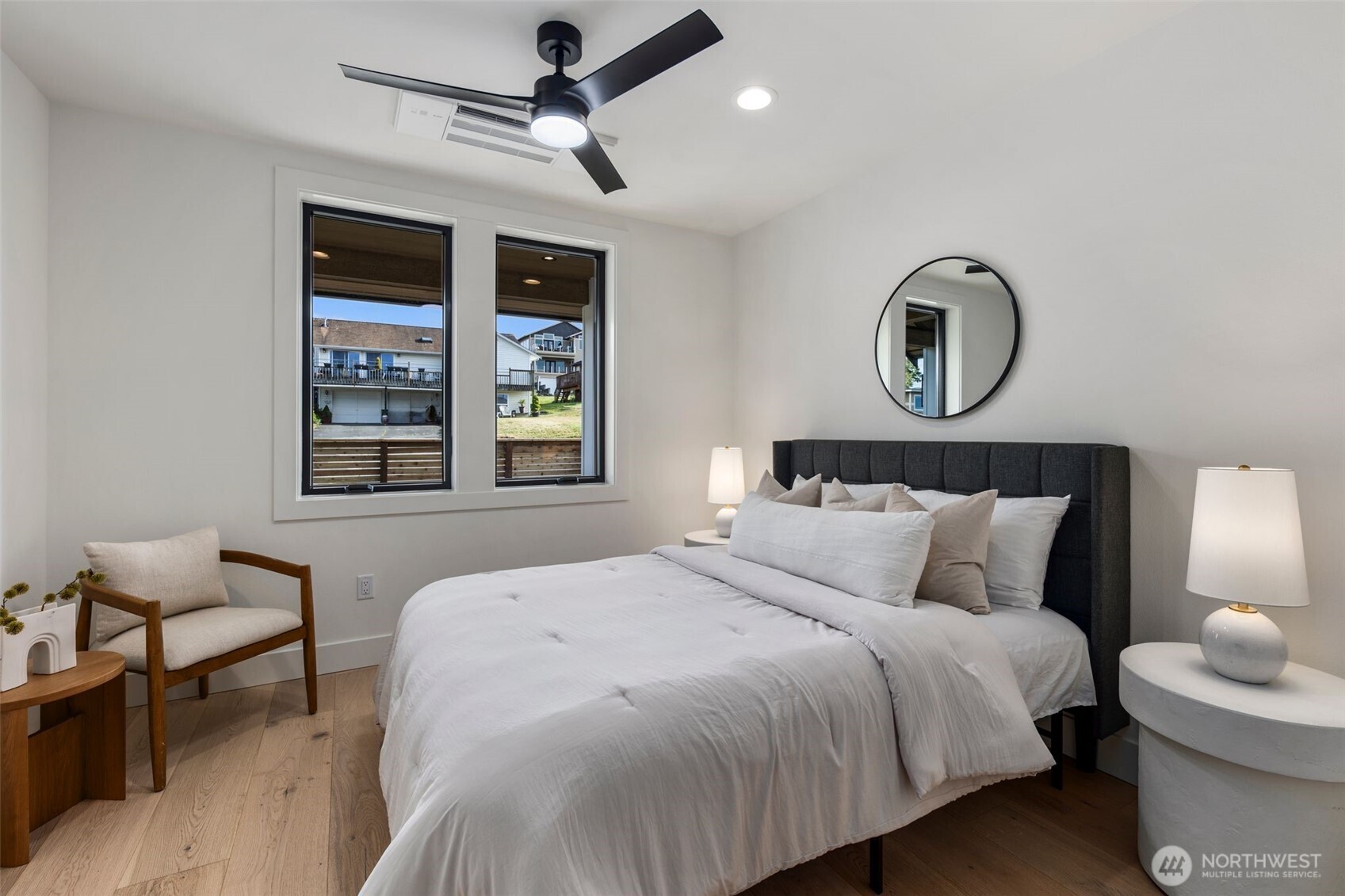 5301 North Commercial Street Ruston, WA 98407 - Photo 18 of 40 a bedroom with bed and a window