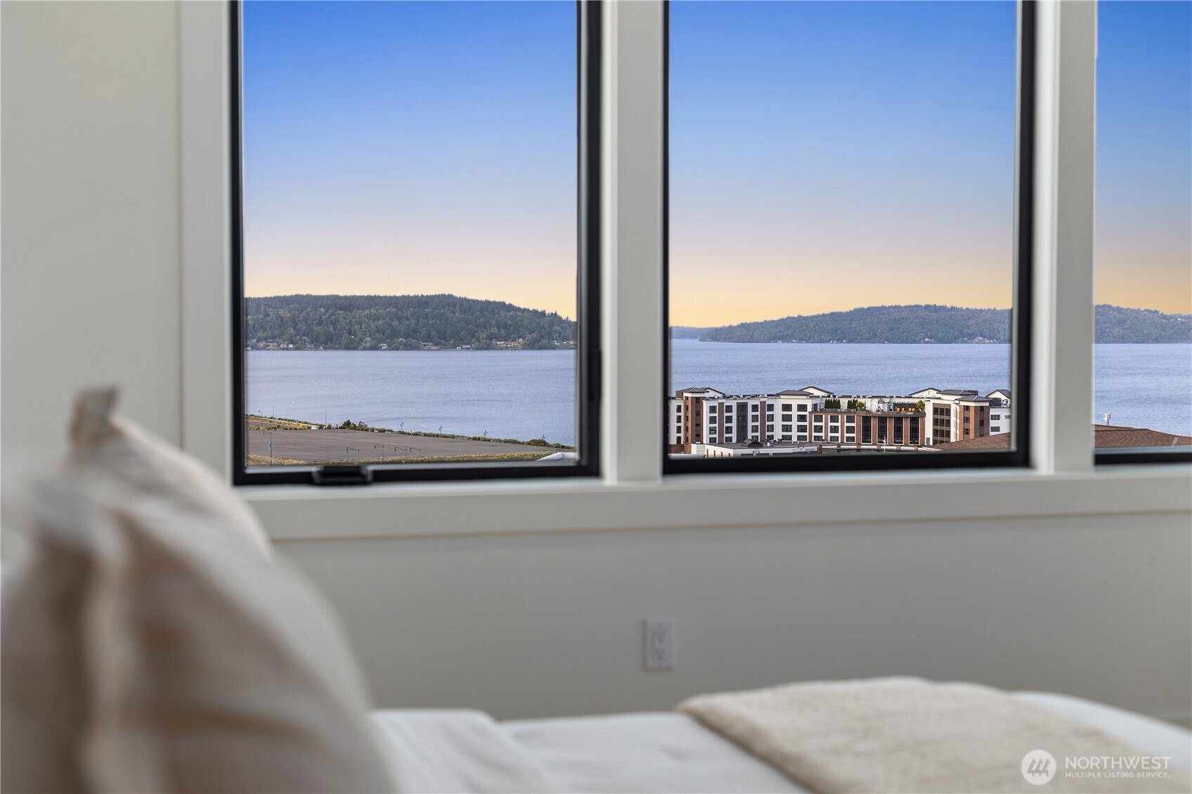 5301 North Commercial Street Ruston, WA 98407 - Photo 22 of 40 a view of a door and two windows