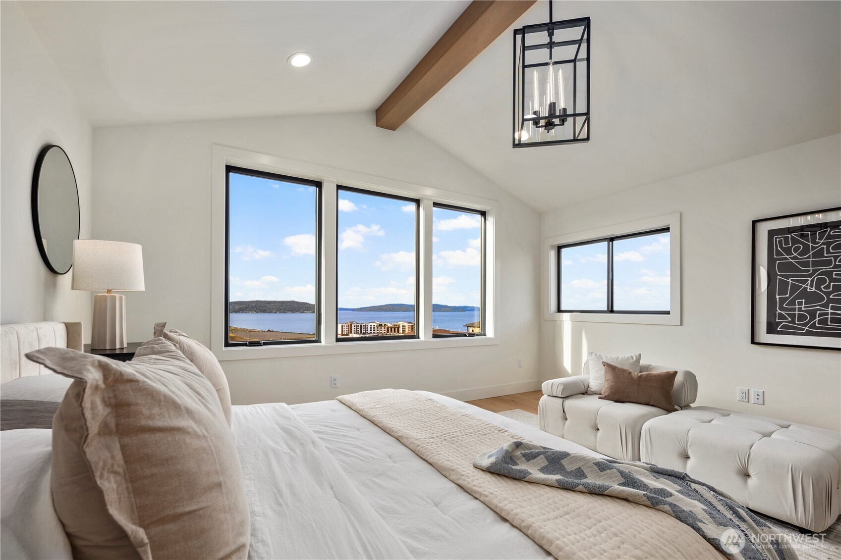 5301 North Commercial Street Ruston, WA 98407 - Photo 23 of 40 a bedroom with a bed and a large window