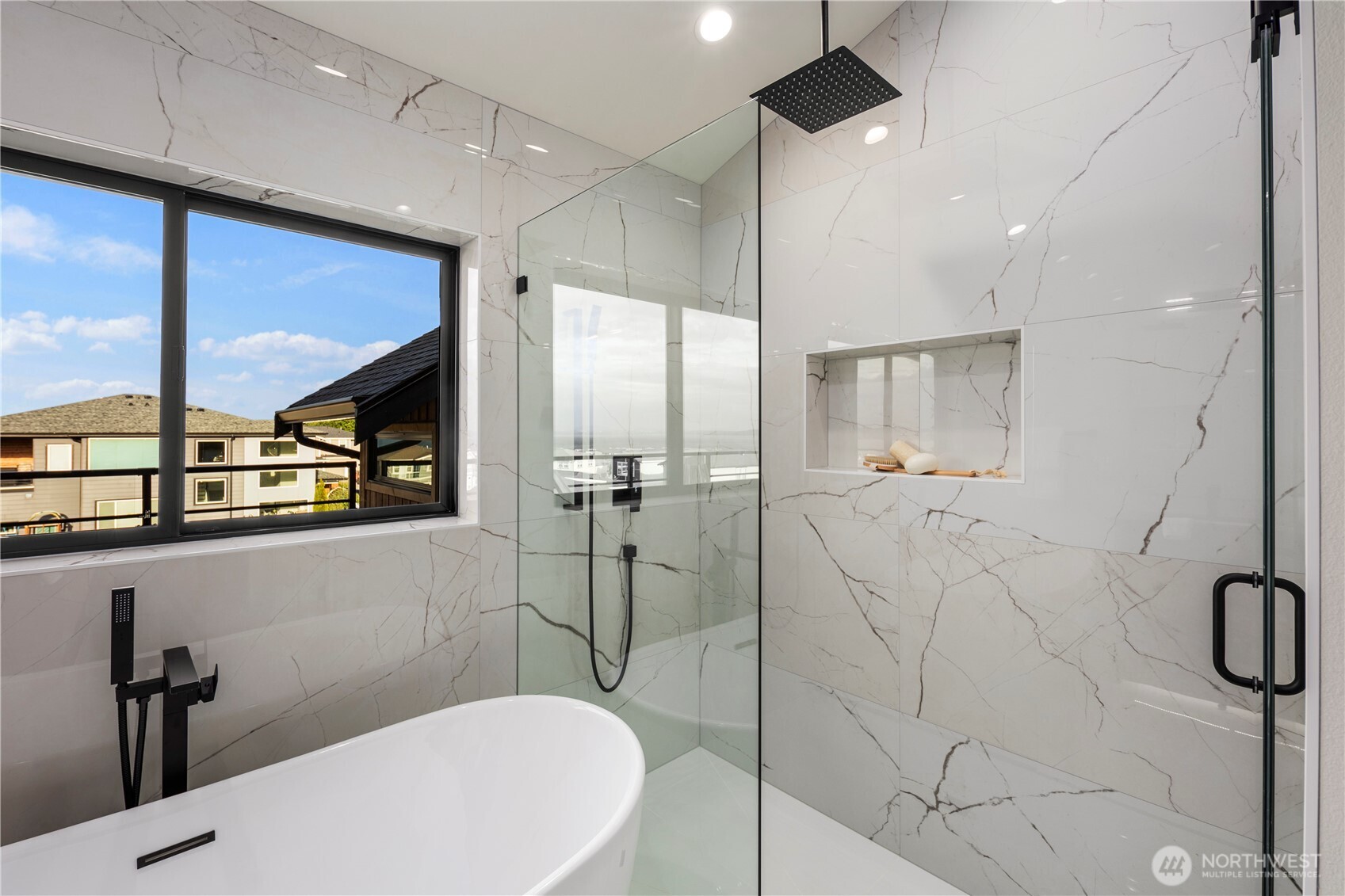 5301 North Commercial Street Ruston, WA 98407 - Photo 26 of 40 a bathroom with a bathtub and a chandelier