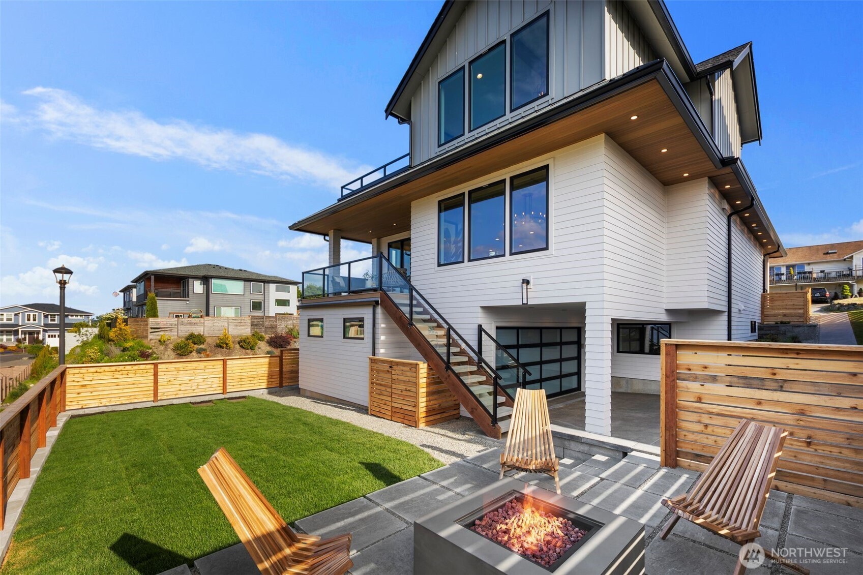 5301 North Commercial Street Ruston, WA 98407 - Photo 37 of 40 a front view of a house with garden