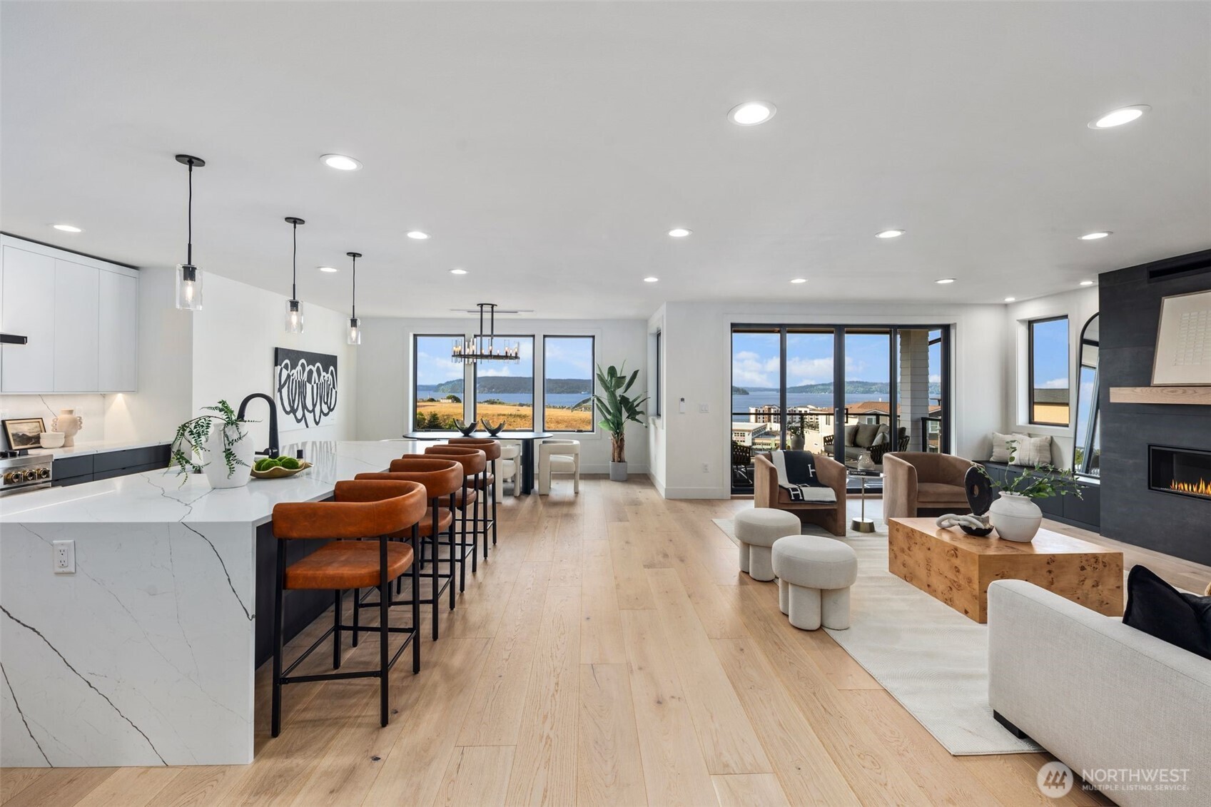 5301 North Commercial Street Ruston, WA 98407 - Photo 5 of 40 a living room with furniture and a large window