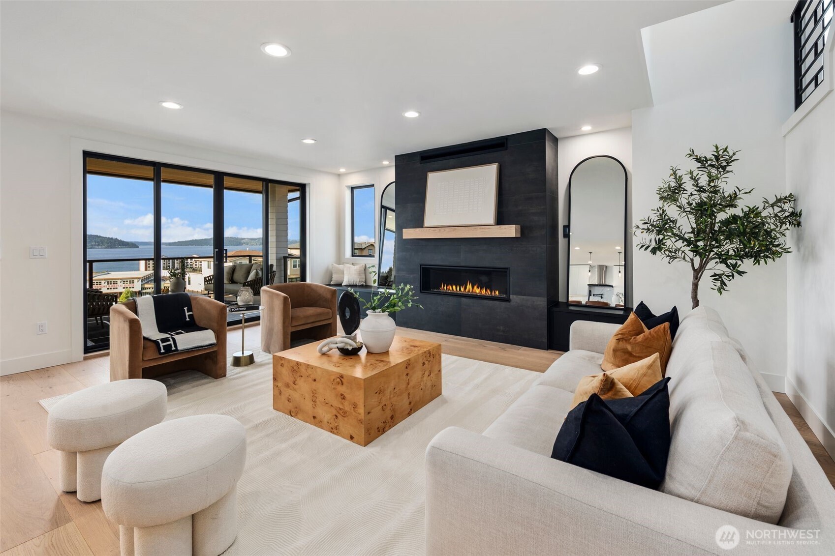 5301 North Commercial Street Ruston, WA 98407 - Photo 6 of 40 a living room with furniture fireplace and a large window