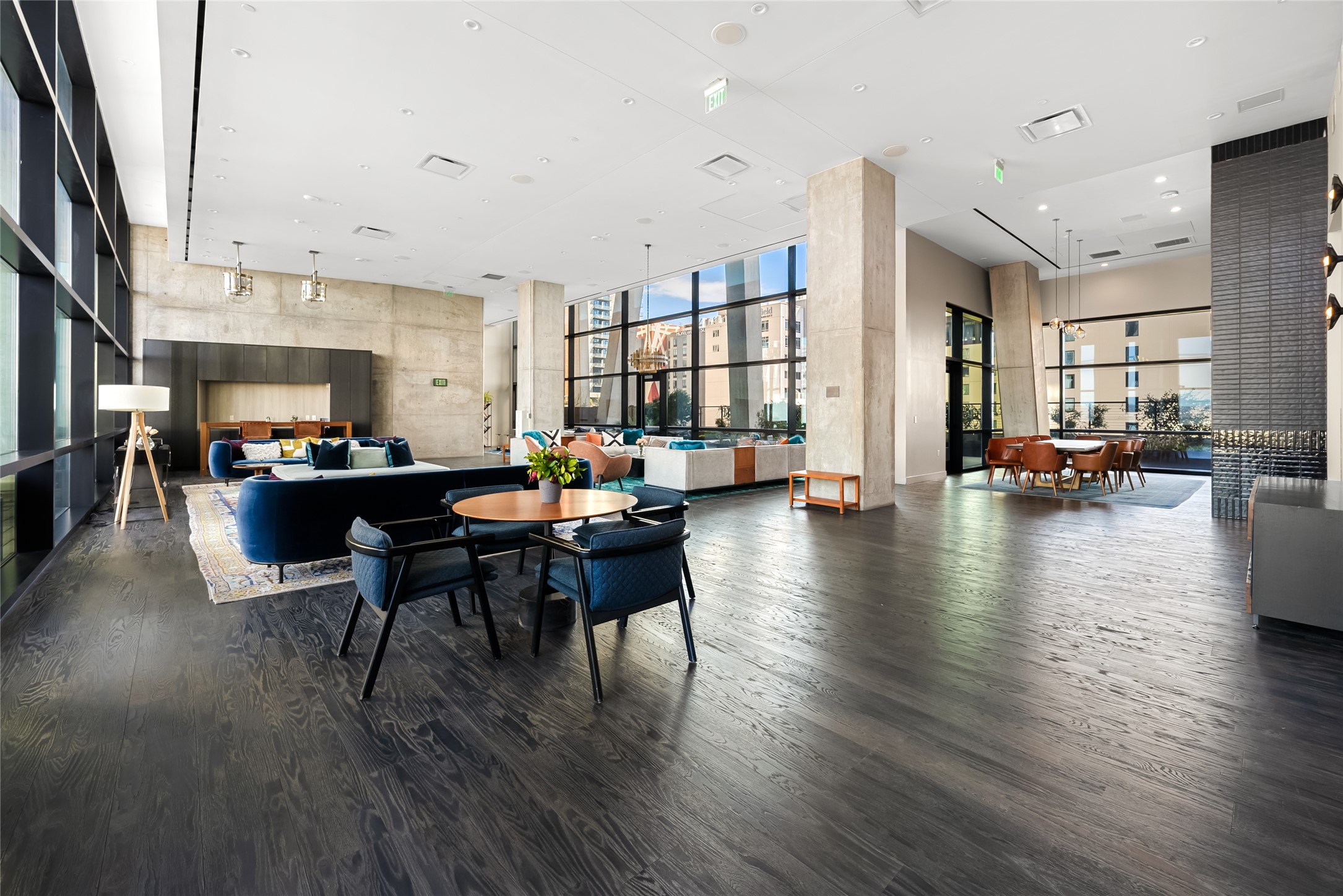 70 Rainey Street, Unit 2106 Austin, TX 78701 - Photo 14 of 26 a view of a dining room with furniture and wooden floor