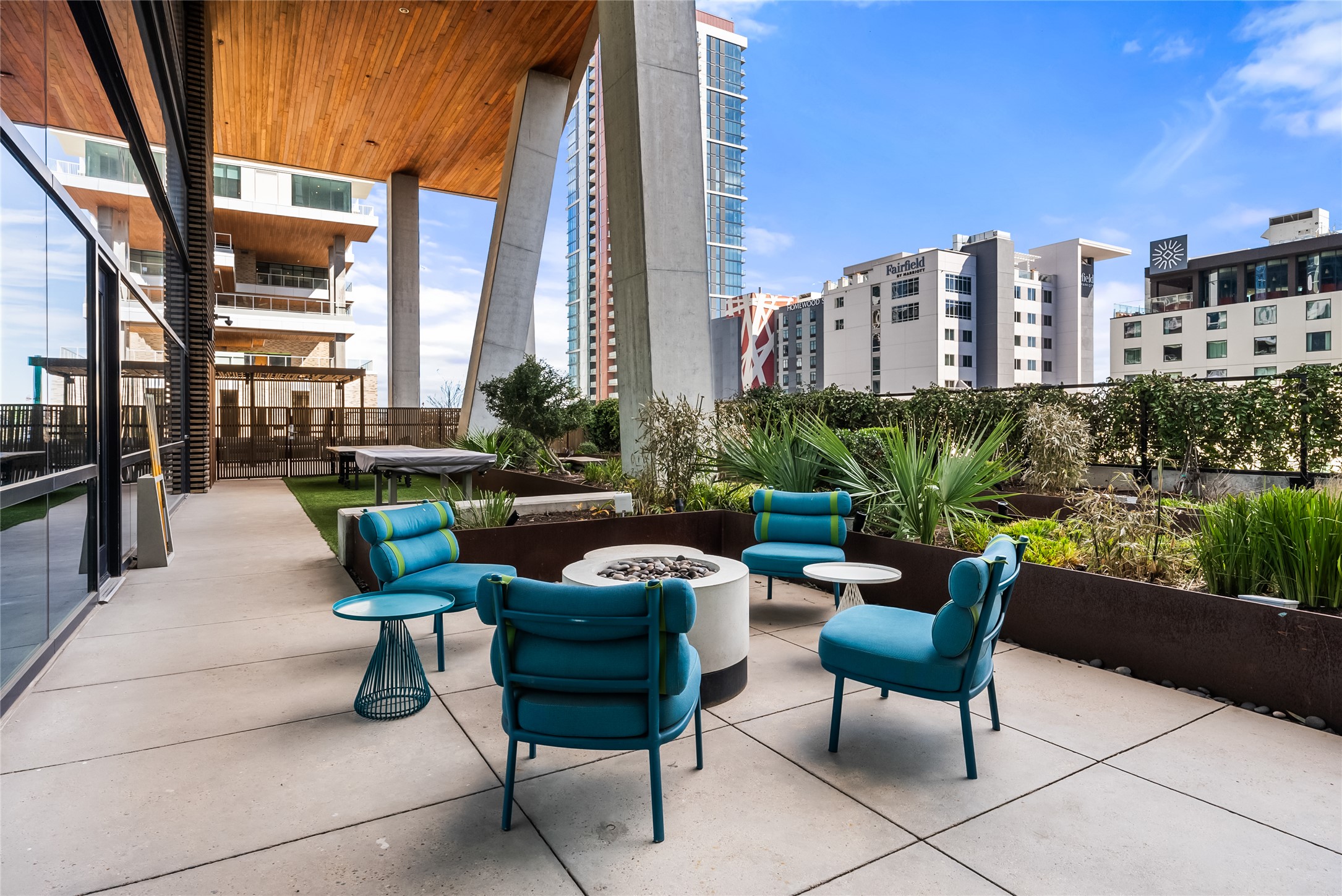 70 Rainey Street, Unit 2106 Austin, TX 78701 - Photo 25 of 26 a building outdoor space with patio furniture