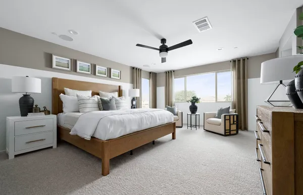 a bed room with a bed and a couch
