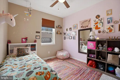 a bedroom with a bed and cabinets