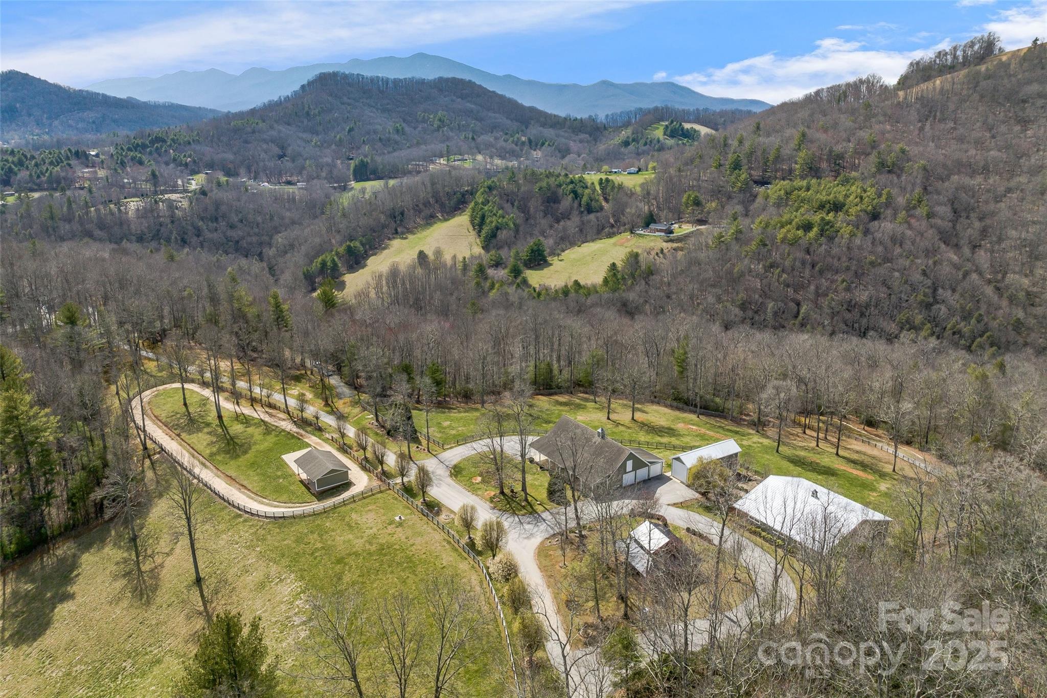 1987 Rabbit Hop Road Spruce Pine, NC 28777 - Photo 2 of 47 a view of a swimming pool with mountains in the background
