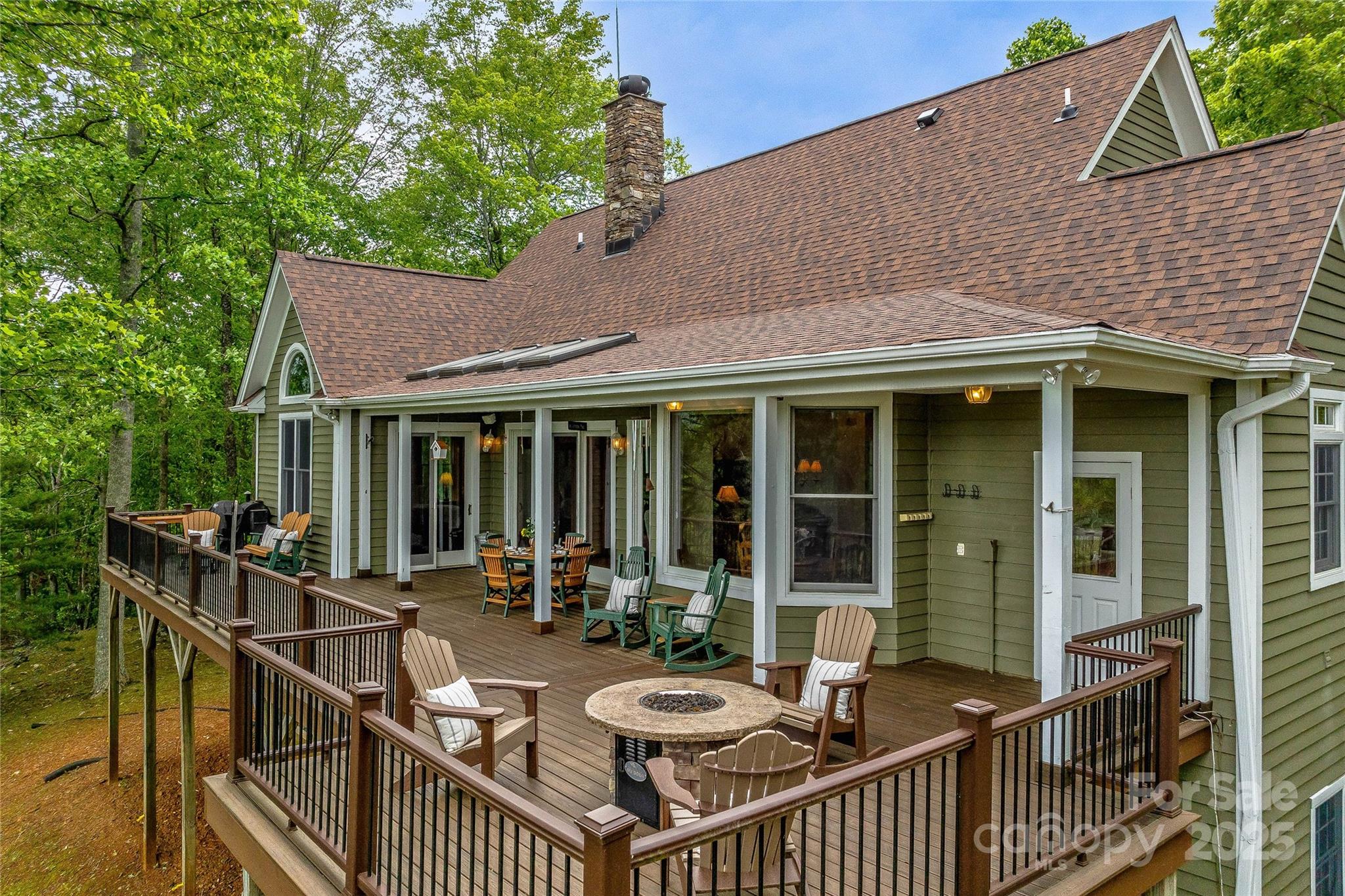 1987 Rabbit Hop Road Spruce Pine, NC 28777 - Photo 22 of 47 a view of a house with backyard and sitting area