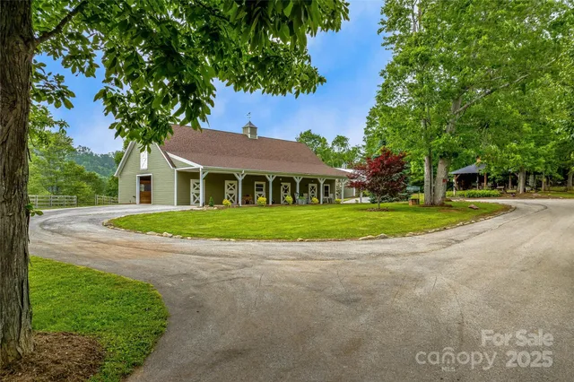 a view of house with yard