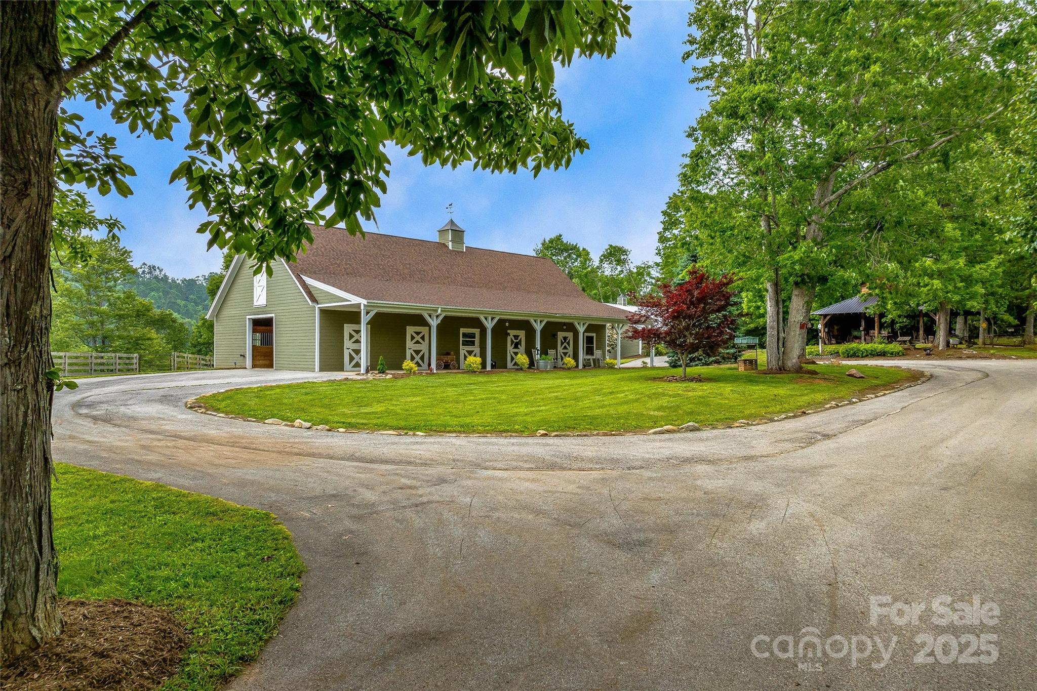 1987 Rabbit Hop Road Spruce Pine, NC 28777 - Photo 3 of 47 a view of house with yard