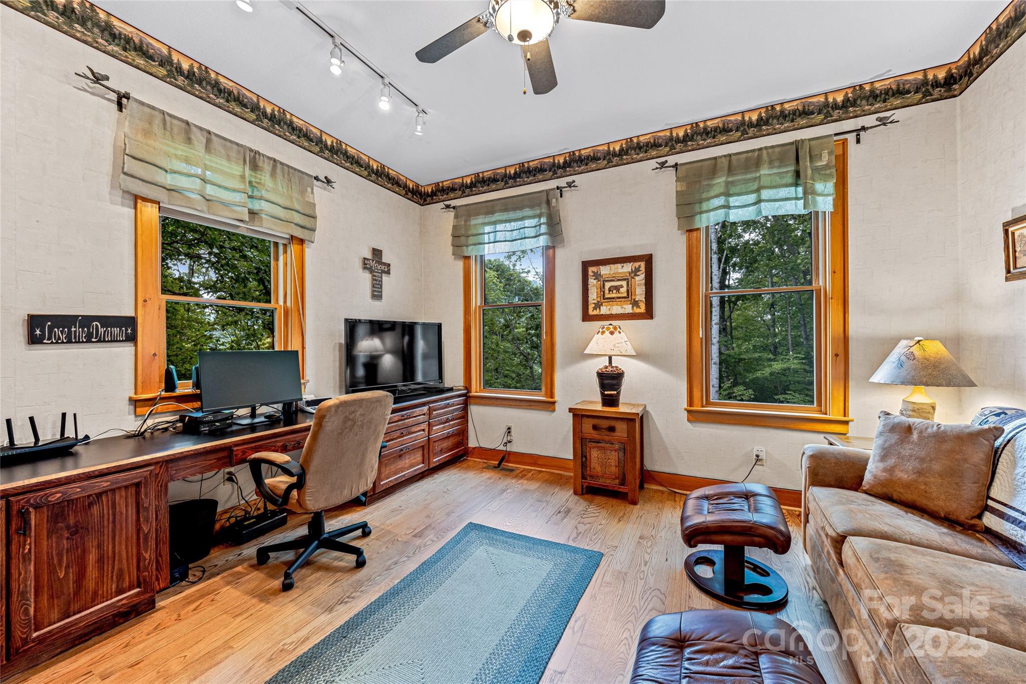 1987 Rabbit Hop Road Spruce Pine, NC 28777 - Photo 33 of 47 a view of a livingroom with workspace and a window