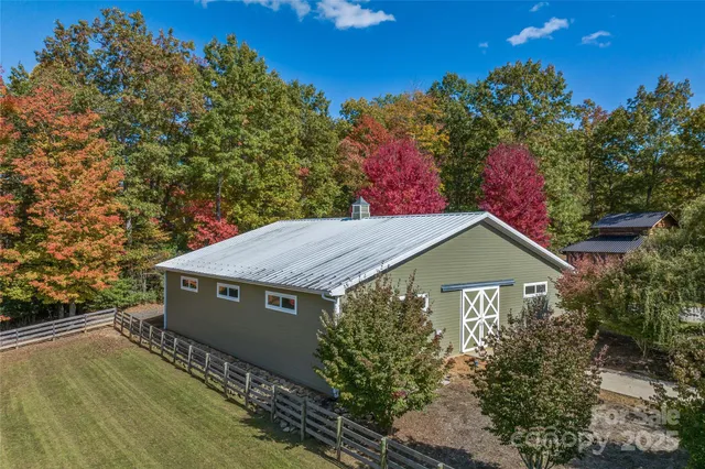 a house with trees in the background