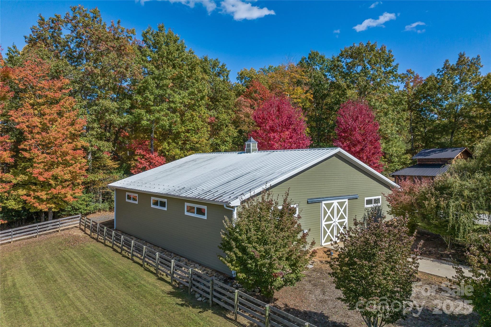1987 Rabbit Hop Road Spruce Pine, NC 28777 - Photo 4 of 47 a house with trees in the background