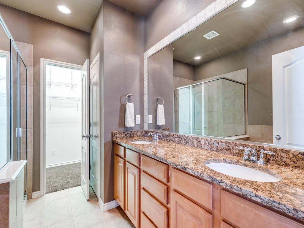 15741 Seabolt Place, Unit 28 Addison, TX 75001 - Photo 18 of 40 a bathroom with a granite countertop sink and a mirror
