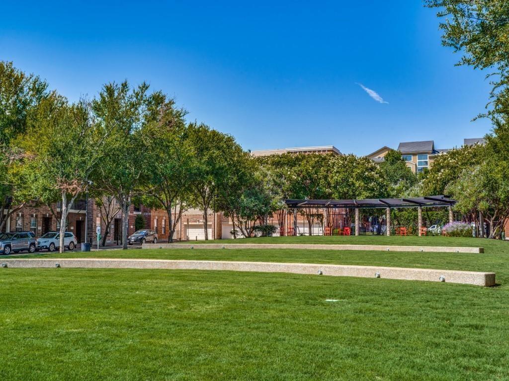 15741 Seabolt Place, Unit 28 Addison, TX 75001 - Photo 32 of 40 a front view of a building and trees