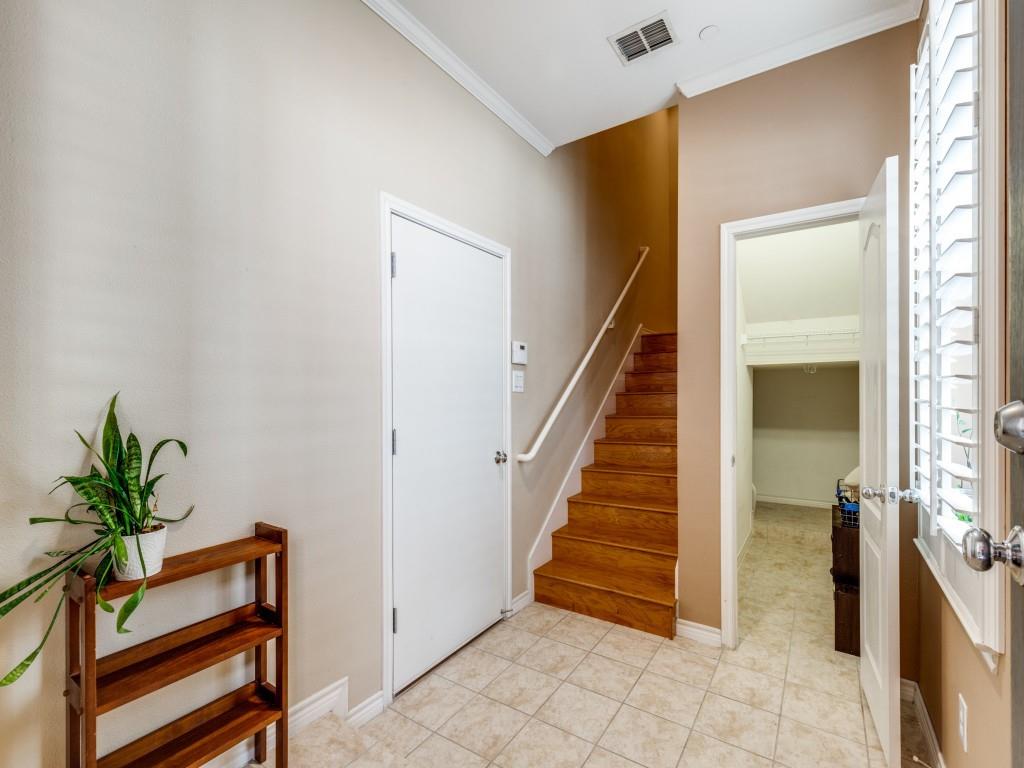 15741 Seabolt Place, Unit 28 Addison, TX 75001 - Photo 4 of 40 a view of entryway and hall with wooden floor