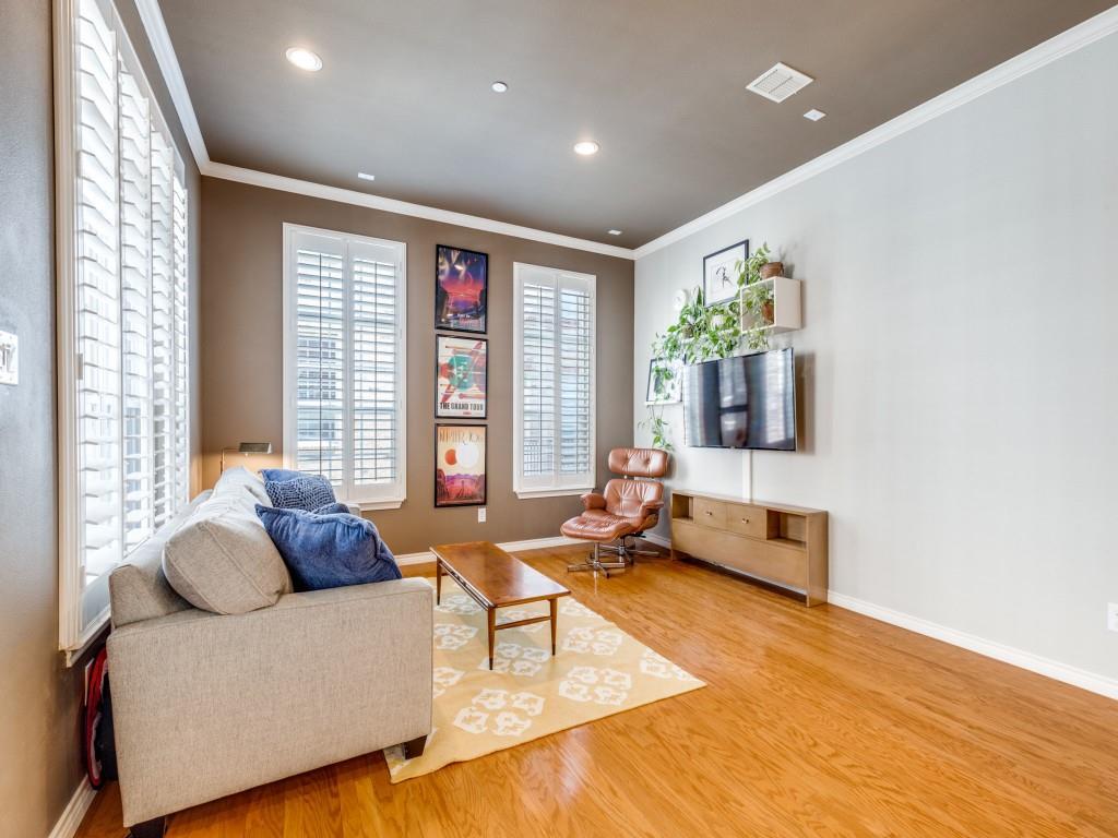 15741 Seabolt Place, Unit 28 Addison, TX 75001 - Photo 6 of 40 a living room with furniture and a flat screen tv