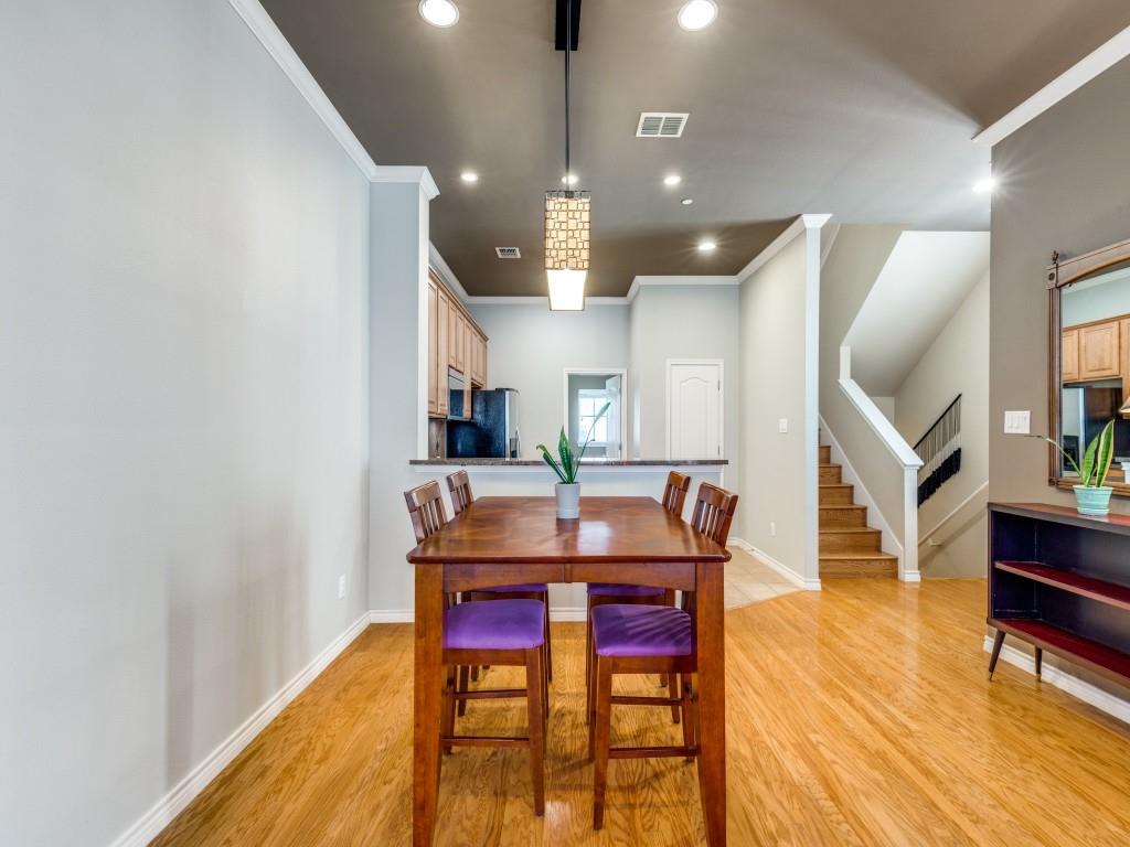 15741 Seabolt Place, Unit 28 Addison, TX 75001 - Photo 8 of 40 a dining room with furniture and wooden floor