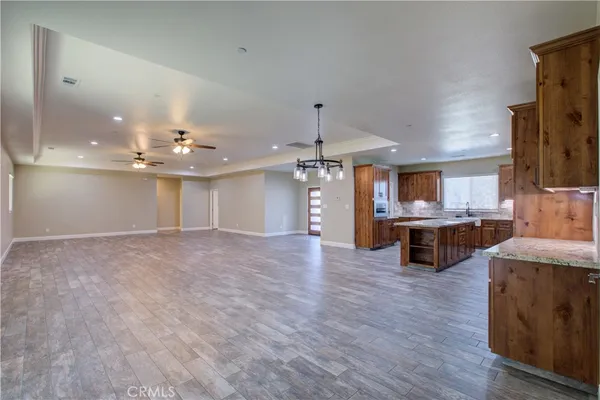 a view of a kitchen and dining room
