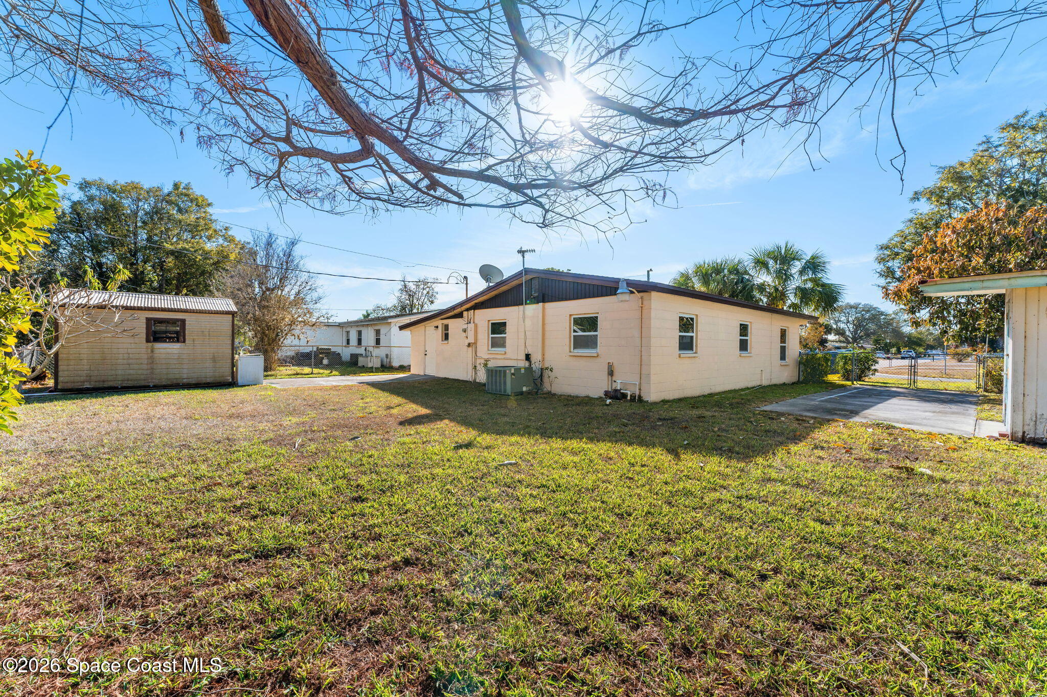1045 Collins Street Melbourne, FL 32935 - Photo 22 of 27 a view of a outdoor space with a house