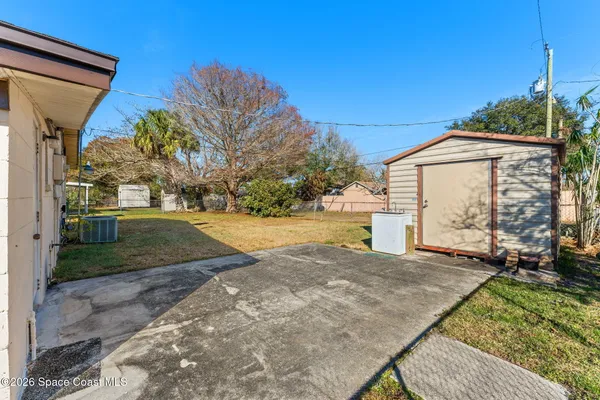 a view of backyard of house