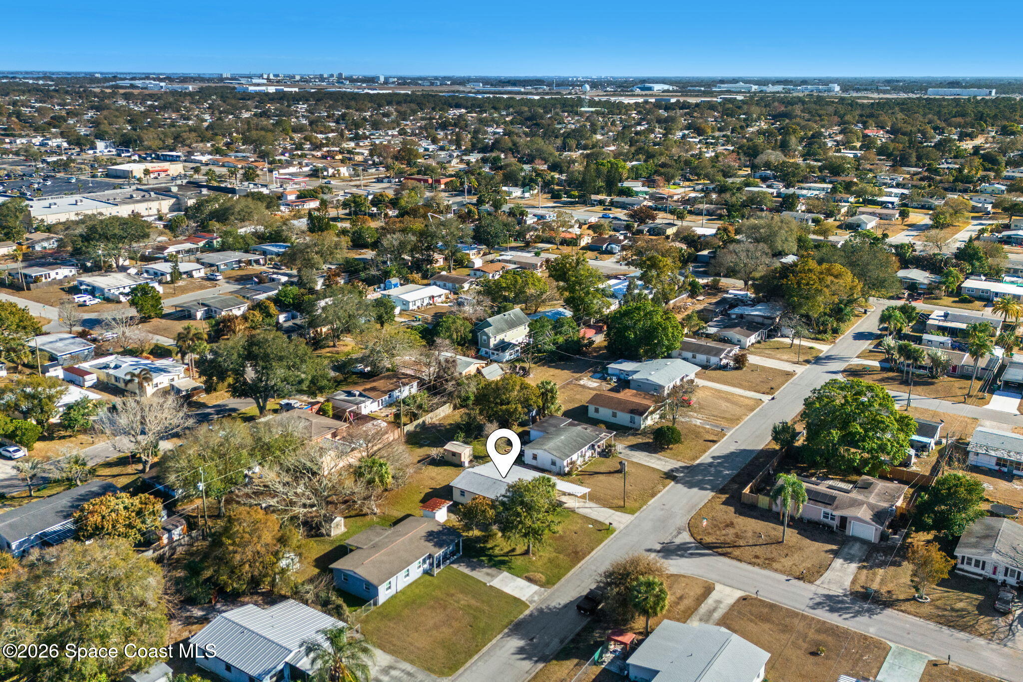 1045 Collins Street Melbourne, FL 32935 - Photo 24 of 27 an aerial view of multiple house
